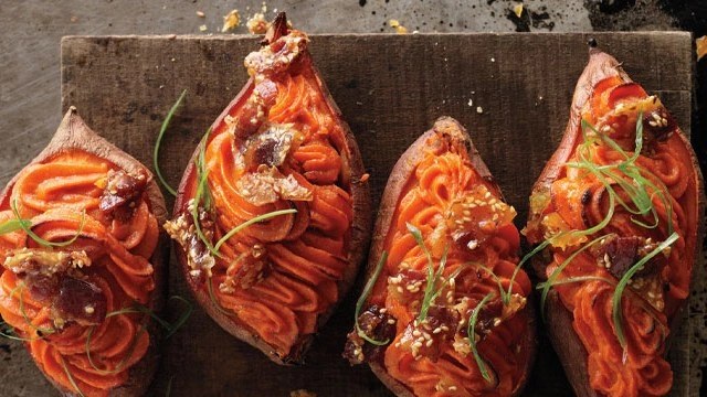 Twice-baked sweet potatoes piped into their skins and topped with bacon and green onion